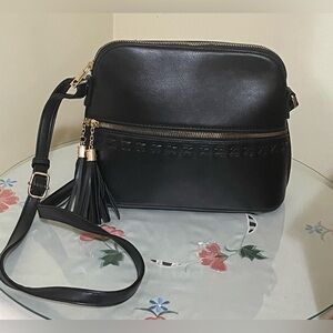 Elegant Black Crossbody Bag with tassels and whipstitch design